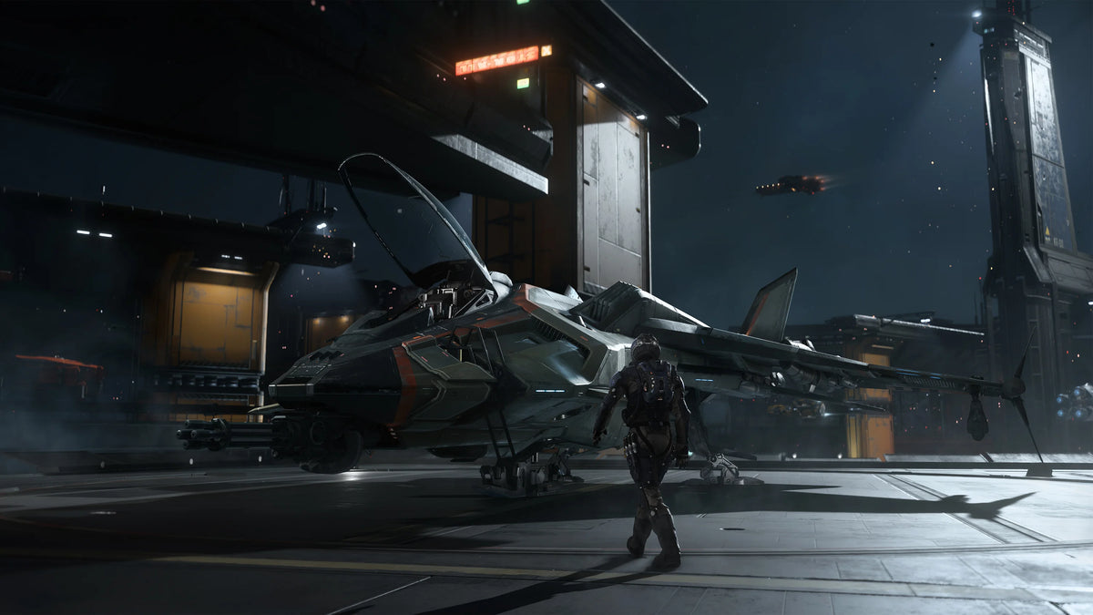 A pilot approaches a Gladius in a Squadron 42 hangar