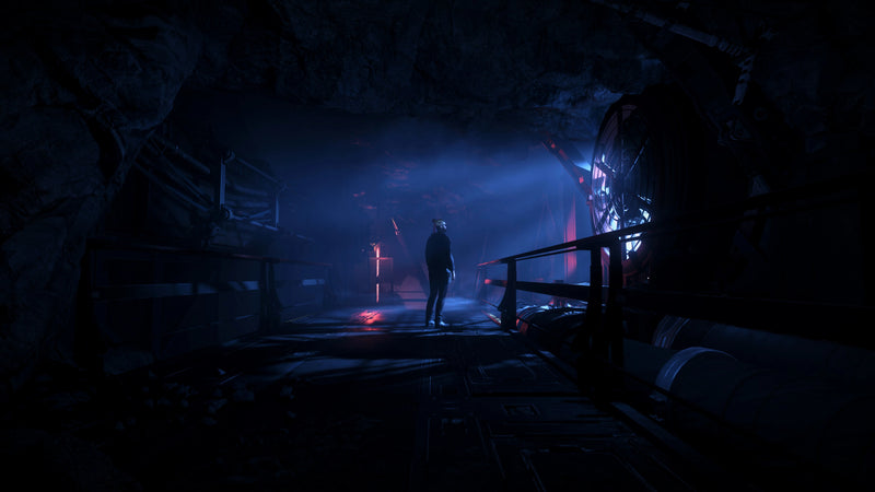 A lone character stands on a dark industrial walkway at Grim Hex in blue and red light