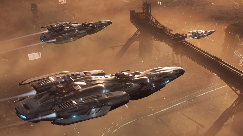 MISC Starlancer MAX ships flying above an industrial city