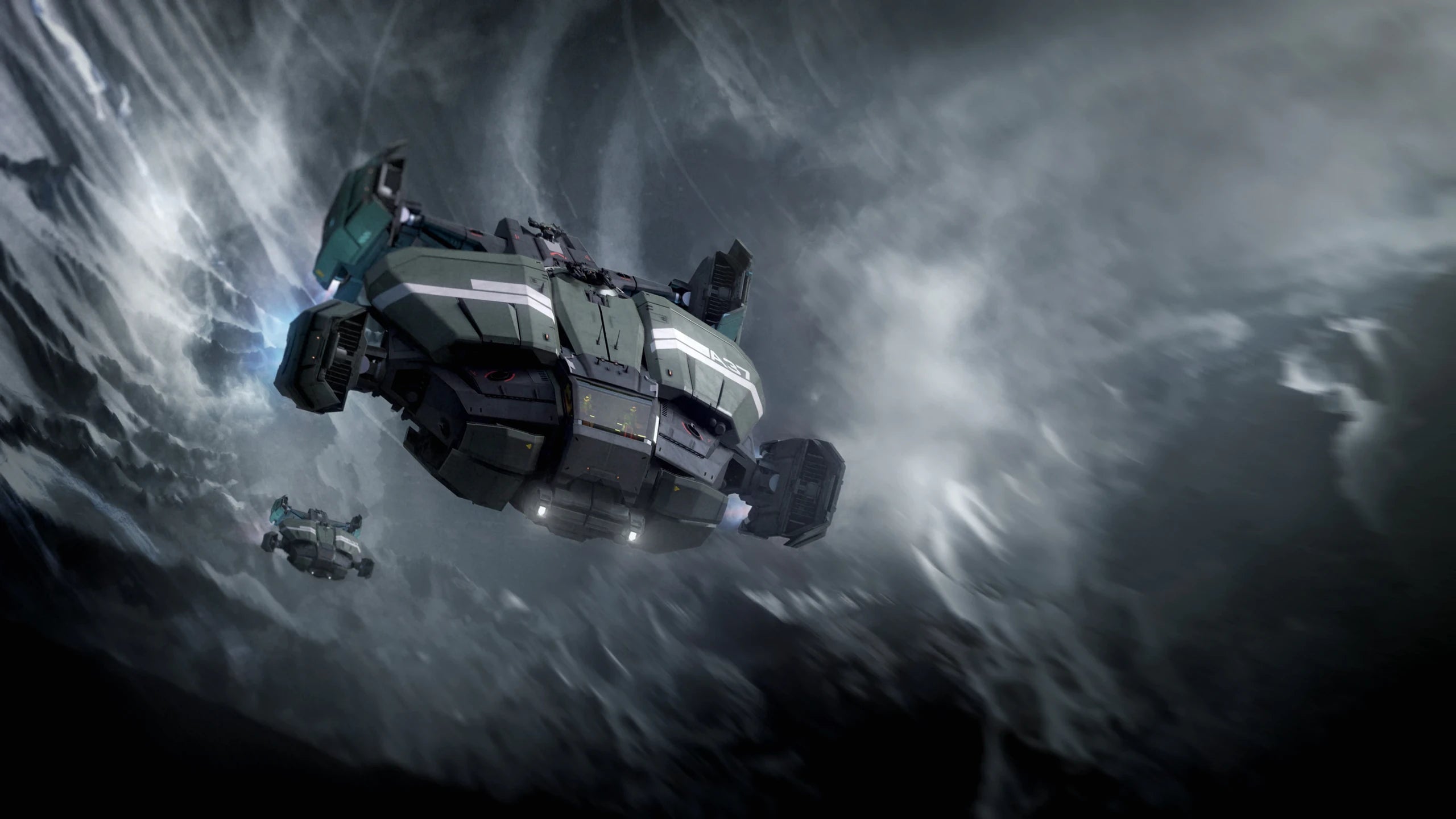 A pair of Legionnaire flying in formation through the mountains