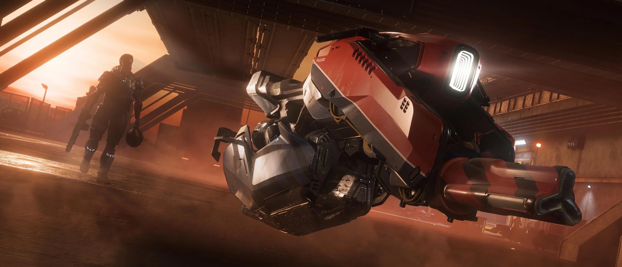 Pulse - x2 parked with security beside them in Star Citizen
